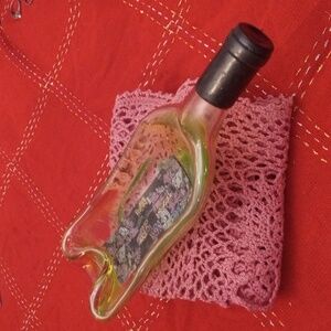 Unique melted wine bottle ash tray